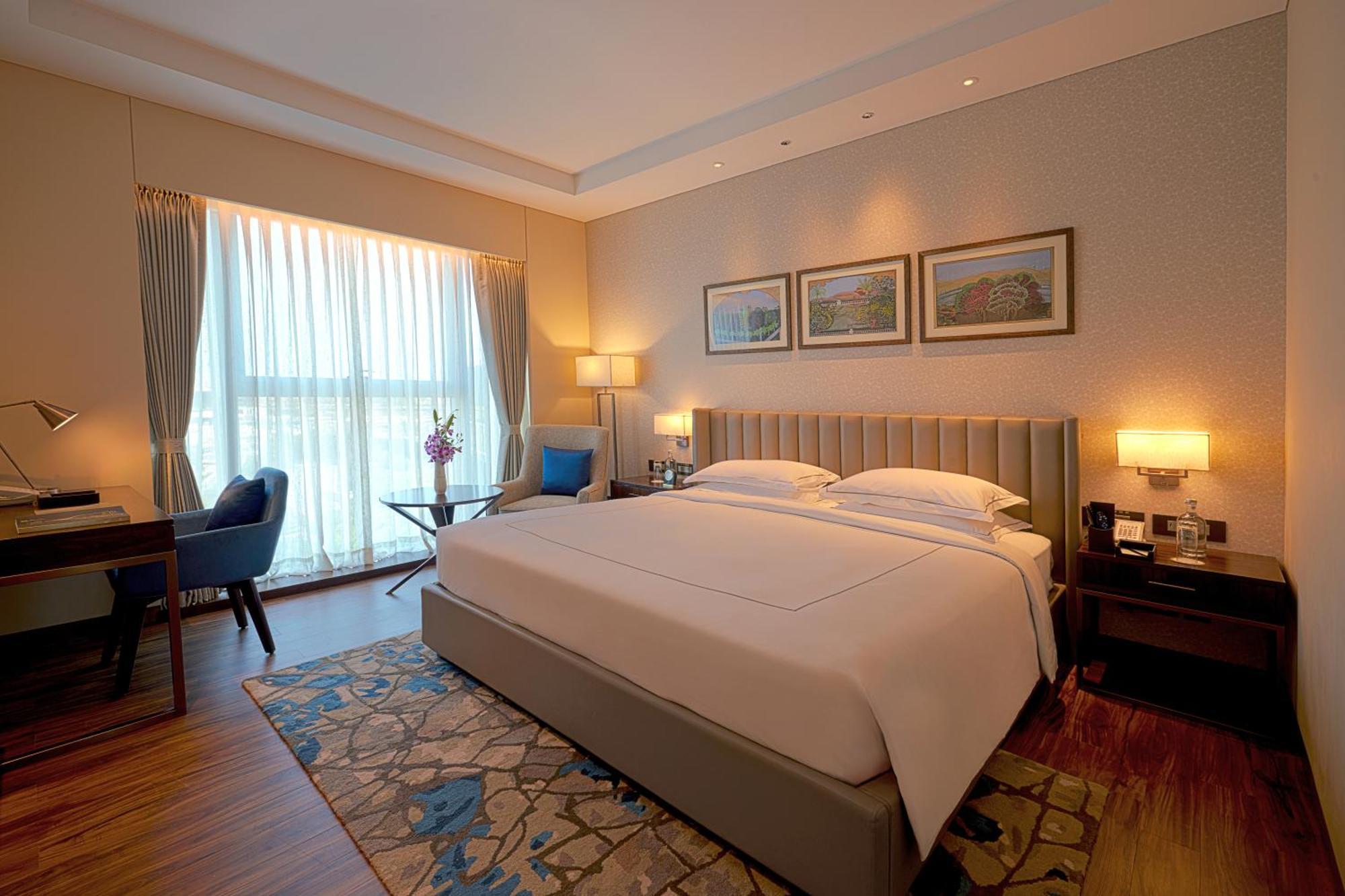 Taj Bangalore Devanahalli Eksteriør bilde A bedroom at the Taj Bengal